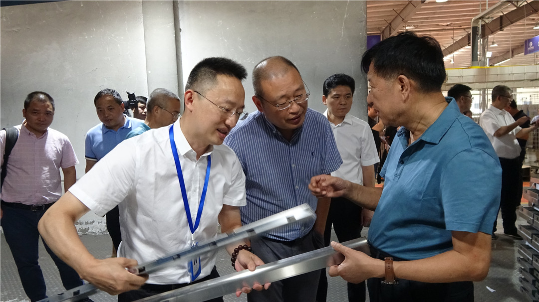 浙智专委主任毛光烈一行到访新城注册集成灶，交流产业数字化转型